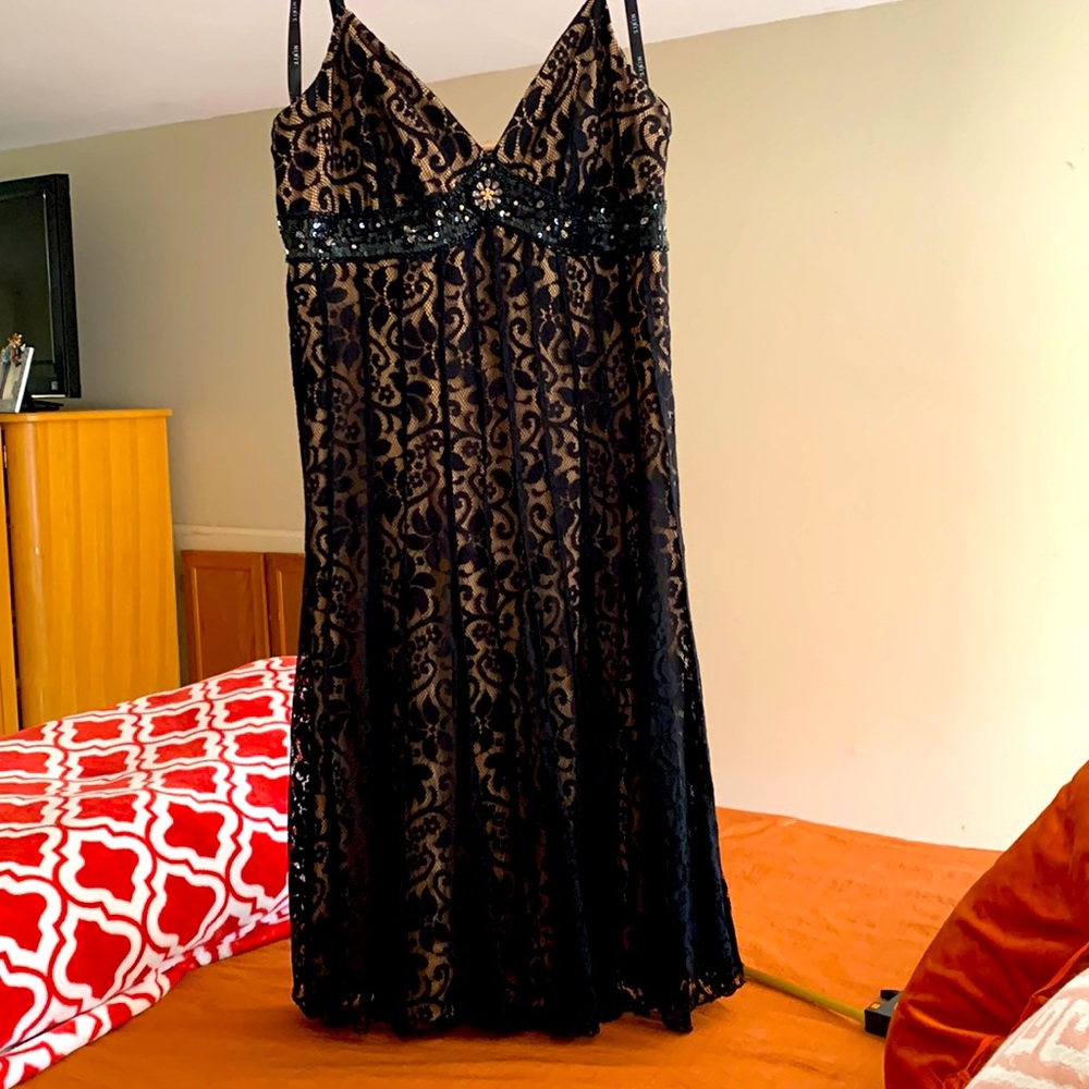 Little black dress Size 6 Fabric is soft comfy & forgiving Perfect Semi formal.